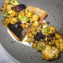 Gluten-free salmon entree from Society Cafe at Walker Hotel